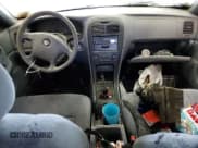 ✅ 2003 Kia Optima LX • VIN: KNAGD126335211255 • Лот: 60637665. Опубликован ранее на Copart с пробегом Не указан. Бесплатный доступ к архиву аукционных продаж из США и подробный отчёт об истории автомобиля на DreamBid. Изображение 8.