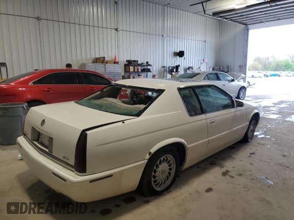 ✅ 2001 Cadillac Eldorado Touring ETC • VIN: 1G6ET12911B106819 • Lot: 55480155. Wystawiony na Copart z przebiegiem 97 422 mil. Bezpłatny archiwum sprzedaży aukcyjnych z USA i szczegółowy raport historii pojazdu na DreamBid. Zdjęcie 3.