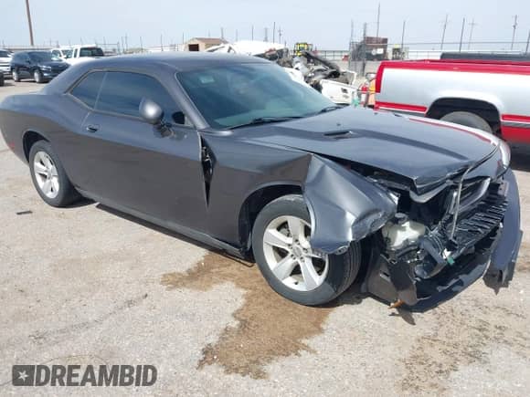 2014 Dodge Challenger SXT 100th Anniversary z VIN 2C3CDYAGXEH298415, wystawiony jako IAAI lot #42133602 z przebiegiem 126 523 mil mil oraz . Historia ofert i sprzedaży dostępna na DreamBid. Obrazek 1.