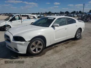 ✅ 2013 Dodge Charger SE • VIN: 2C3CDXBG8DH734850 • Lot: 84279015. Wystawiony na Copart z przebiegiem 239 305 mil. Bezpłatny archiwum sprzedaży aukcyjnych z USA i szczegółowy raport historii pojazdu na DreamBid. Zdjęcie 1.