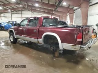 ✅ 2000 Dodge Dakota • VIN: 1B7GG2AXXYS654876 • Lot: 50530435. Wystawiony na Copart z przebiegiem 139 163 mil. Bezpłatny archiwum sprzedaży aukcyjnych z USA i szczegółowy raport historii pojazdu na DreamBid. Zdjęcie 2.