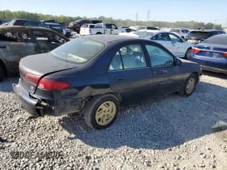 ✅ 2001 Ford Escort Fleet • VIN: 3FAFP13PX1R120920 • Lot: 75643024. Listed on Copart with 128,089 mi. Free auction sales archive from the USA and detailed vehicle history report at DreamBid. Image 3.