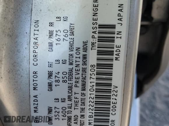 ✅ 2001 Mazda Protege DX • VIN: JM1BJ222210417508 • Lot: 83482064. Listed on Copart with Not provided. Free auction sales archive from the USA and detailed vehicle history report at DreamBid. Image 12.