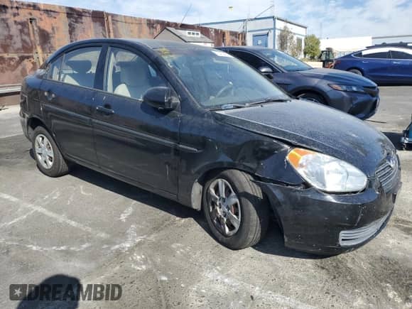 2006 Hyundai Accent GLS with VIN KMHCN46C66U018880, listed as a Copart auction lot 78419484 with Not provided miles and Salvage title. Bid and sale history available at DreamBid. Image 4.