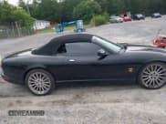 ✅ 2005 Jaguar XK • VIN: SAJDA42B253A42460 • Lot: 42371183. Wystawiony na IAAI z przebiegiem 118 104 mil. Bezpłatny archiwum sprzedaży aukcyjnych z USA i szczegółowy raport historii pojazdu na DreamBid. Zdjęcie 13.