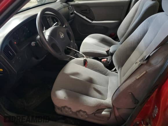 2004 Hyundai Elantra GLS with VIN KMHDN46D14U711429, listed as a Copart auction lot 85075885 with 92,027 mi miles and Salvage title. Bid and sale history available at DreamBid. Image 7.