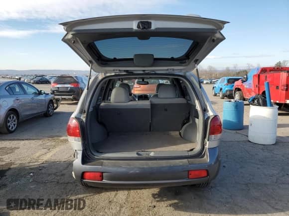 2005 Hyundai Santa Fe GLS z VIN KM8SC73E85U968620, wystawiony jako Copart lot #83382614 z przebiegiem 161 126 mil mil oraz Szkoda całkowita • Salvage title. Historia ofert i sprzedaży dostępna na DreamBid. Obrazek 6.