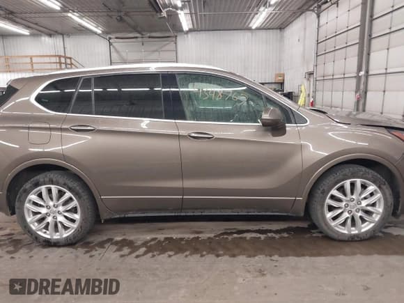 ✅ 2019 Buick Envision Premium • VIN: LRBFX3SX7KD011959 • Lot: 43484767. Wystawiony na IAAI z przebiegiem 94 593 mil. Bezpłatny archiwum sprzedaży aukcyjnych z USA i szczegółowy raport historii pojazdu na DreamBid. Zdjęcie 14.