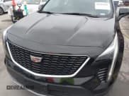 ✅ 2020 Cadillac XT4 FWD Premium Luxury • VIN: 1GYFZCR48LF142955 • Lot: 41255161. Wystawiony na IAAI z przebiegiem 39 830 mil. Bezpłatny archiwum sprzedaży aukcyjnych z USA i szczegółowy raport historii pojazdu na DreamBid. Zdjęcie 6.