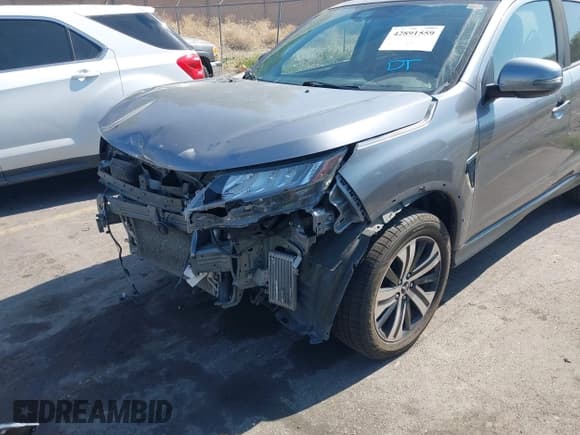 ✅ 2020 Mitsubishi Outlander ES • VIN: JA4AR3AU0LU018017 • Lot: 42891559. Listed on IAAI with 77,061 mi. Free auction sales archive from the USA and detailed vehicle history report at DreamBid. Image 6.