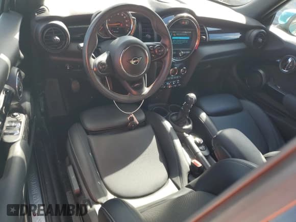 ✅ 2021 MINI Convertible Cooper S • VIN: WMWWJ5C0XM3M13934 • Лот: 86785445. Опубликован ранее на Copart с пробегом 24 063 миль. Бесплатный доступ к архиву аукционных продаж из США и подробный отчёт об истории автомобиля на DreamBid. Изображение 8.