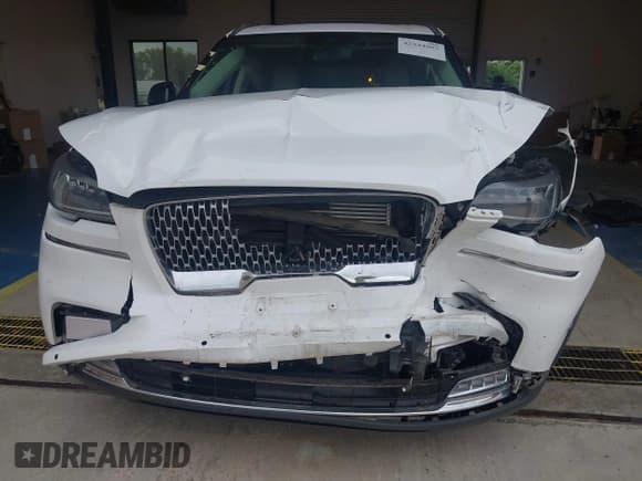 ✅ 2021 Lincoln Aviator Reserve • VIN: 5LM5J7WC3MGL00411 • Lot: 42444802. Listed on IAAI with 58,897 mi. Free auction sales archive from the USA and detailed vehicle history report at DreamBid. Image 6.