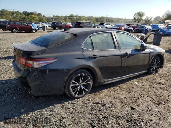 2019 Toyota Camry LE z VIN 4T1B11HK0KU850297, wystawiony jako Copart lot #86070935 z przebiegiem 213 970 mil mil oraz Czysty tytuł • Clean title. Historia ofert i sprzedaży dostępna na DreamBid. Obrazek 3.