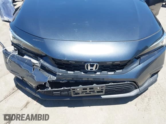 ✅ 2023 Honda Civic LX • VIN: 19XFL2H53PE013386 • Lot: 42702560. Listed on IAAI with 14,471 mi. Free auction sales archive from the USA and detailed vehicle history report at DreamBid. Image 6.