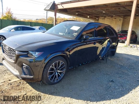 ✅ 2025 Mazda CX-70 S Premium • VIN: JM3KJDHCXS1111882 • Lot: 43529251. Listed on IAAI with 20,711 mi. Free auction sales archive from the USA and detailed vehicle history report at DreamBid. Image 2.