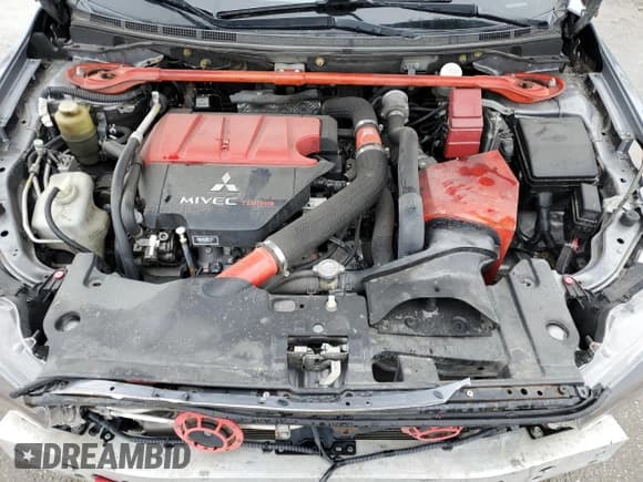 ✅ 2012 Mitsubishi Lancer Evolution MR • VIN: JA32W5FV5CU013118 • Lot: 51825555. Wystawiony na Copart z przebiegiem 119 651 mil. Bezpłatny archiwum sprzedaży aukcyjnych z USA i szczegółowy raport historii pojazdu na DreamBid. Zdjęcie 11.