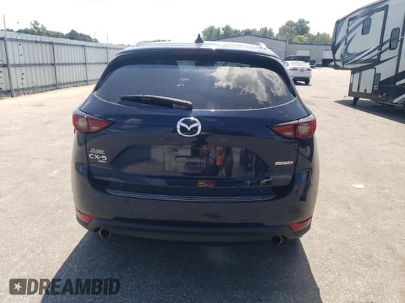 ✅ 2020 Mazda CX-5 Grand Touring Reserve • VIN: JM3KFBAY7L0849349 • Lot: 71521095. Listed on Copart with 24,443 mi. Free auction sales archive from the USA and detailed vehicle history report at DreamBid. Image 6.