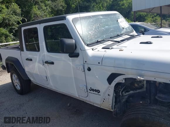 ✅ 2023 Jeep Gladiator Sport S • VIN: 1C6HJTAGXPL539965 • Лот: 42552742. Опубликован ранее на IAAI с пробегом 57 918 миль. Бесплатный доступ к архиву аукционных продаж из США и подробный отчёт об истории автомобиля на DreamBid. Изображение 13.