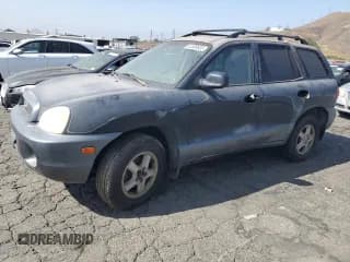 ✅ 2003 Hyundai Santa Fe GLS • VIN: KM8SC13D93U368285 • Lot: 62008835. Wystawiony na Copart z przebiegiem 281 403 mil. Bezpłatny archiwum sprzedaży aukcyjnych z USA i szczegółowy raport historii pojazdu na DreamBid. Zdjęcie 1.