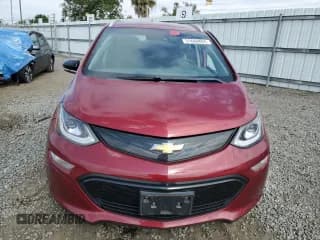✅ 2018 Chevrolet Bolt EV Premier • VIN: 1G1FX6S05J4139274 • Лот: 51660804. Опубликован ранее на Copart с пробегом 56 410 миль. Бесплатный доступ к архиву аукционных продаж из США и подробный отчёт об истории автомобиля на DreamBid. Изображение 5.