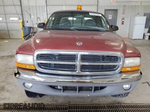 1999 Dodge Dakota SLT z VIN 1B7GG22X0XS197699, wystawiony jako Copart lot #61057935 z przebiegiem 147 833 mil mil oraz Szkoda całkowita • Salvage title. Historia ofert i sprzedaży dostępna na DreamBid. Obrazek 5.