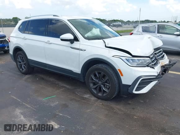 ✅ 2022 Volkswagen Tiguan SE • VIN: 3VV3B7AX1NM042582 • Lot: 43073057. Listed on IAAI with 28,724 mi. Free auction sales archive from the USA and detailed vehicle history report at DreamBid. Image 1.