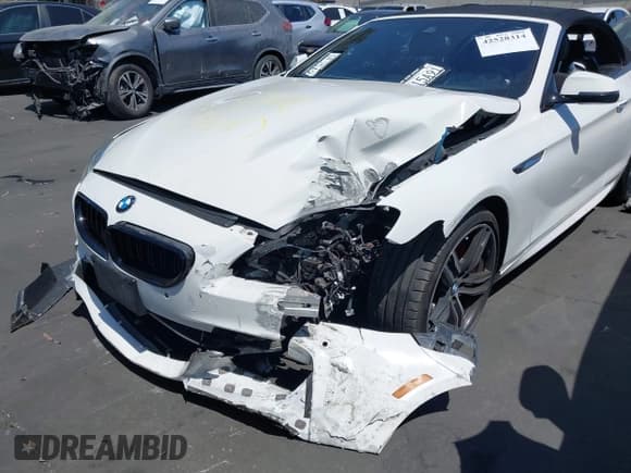 ✅ 2018 BMW 6 Series 650i • VIN: WBA6F5C56JD997087 • Лот: 42528314. Опубликован ранее на IAAI с пробегом 46 219 миль. Бесплатный доступ к архиву аукционных продаж из США и подробный отчёт об истории автомобиля на DreamBid. Изображение 6.