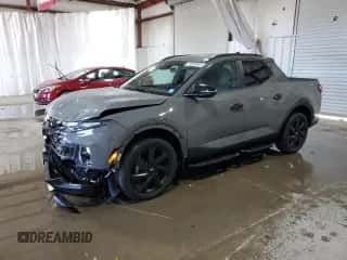2024 Hyundai Santa Cruz Night Edition z VIN 5NTJCDAF1RH084322, wystawiony jako Copart lot #71028344 z przebiegiem 4 125 mil mil oraz Szkoda całkowita • Salvage title. Historia ofert i sprzedaży dostępna na DreamBid. Obrazek 1.