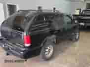 2003 Chevrolet Blazer LS z VIN 1GNCT18X83K175026, wystawiony jako Copart lot #60873315 z przebiegiem 200 267 mil mil oraz Czysty tytuł • Clean title. Historia ofert i sprzedaży dostępna na DreamBid. Obrazek 4.