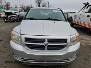 ✅ 2010 Dodge Caliber • VIN: 1B3CB1HA8AD587747 • Лот: 83140504. Опубликован ранее на Copart с пробегом 174 208 миль. Бесплатный доступ к архиву аукционных продаж из США и подробный отчёт об истории автомобиля на DreamBid. Изображение 5.
