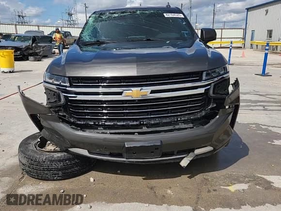 ✅ 2021 Chevrolet Suburban LT • VIN: 1GNSCCKD4MR174227 • Lot: 82164525. Listed on Copart with 99,717 mi. Free auction sales archive from the USA and detailed vehicle history report at DreamBid. Image 14.