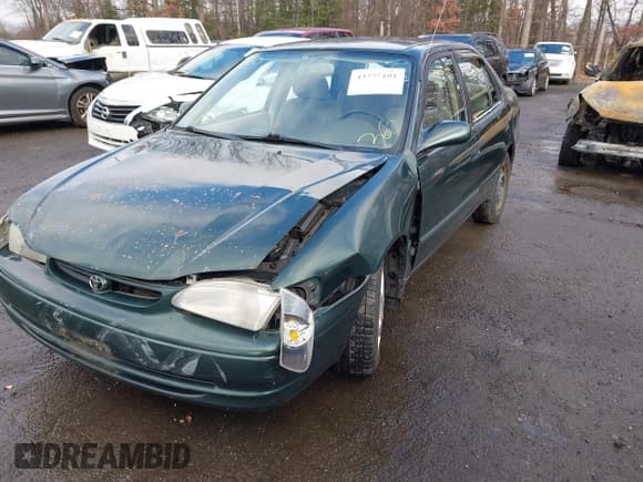 ✅ 2000 Toyota Corolla VE • VIN: 2T1BR18EXYC334347 • Lot: 43777101. Listed on IAAI with 171,626 mi. Free auction sales archive from the USA and detailed vehicle history report at DreamBid. Image 6.