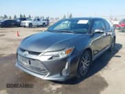 ✅ 2016 Scion tC • VIN: JTKJF5C72GJ019459 • Lot: 43609151. Listed on IAAI with 132,498 mi. Free auction sales archive from the USA and detailed vehicle history report at DreamBid. Image 2.