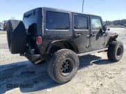 ✅ 2016 Jeep Wrangler Unlimited Rubicon Hard Rock • VIN: 1C4BJWFG9GL209484 • Lot: 87815475. Listed on Copart with 85,729 mi. Free auction sales archive from the USA and detailed vehicle history report at DreamBid. Image 3.