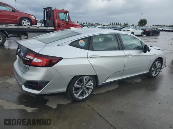 ✅ 2018 Honda Clarity Touring • VIN: JHMZC5F3XJC015360 • Lot: 91234415. Wystawiony na Copart z przebiegiem 48 452 mil. Bezpłatny archiwum sprzedaży aukcyjnych z USA i szczegółowy raport historii pojazdu na DreamBid. Zdjęcie 3.