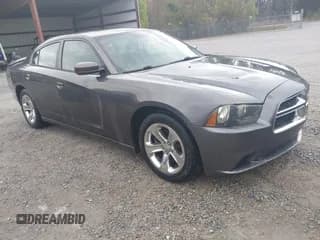 ✅ 2014 Dodge Charger SE • VIN: 2C3CDXBGXEH199182 • Lot: 43775912. Listed on IAAI with 242,567 mi. Free auction sales archive from the USA and detailed vehicle history report at DreamBid. Image 1.