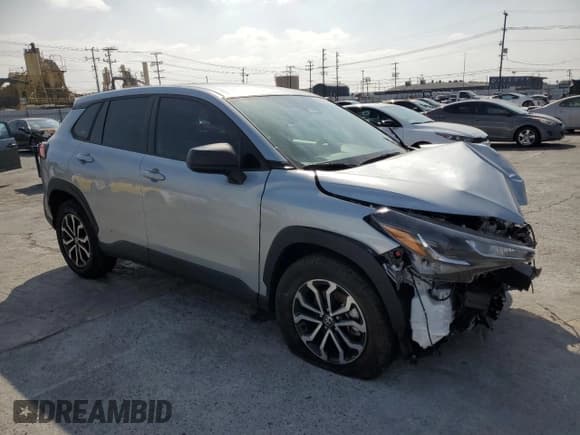 ✅ 2023 Toyota Corolla Cross Hybrid S • VIN: 7MUFBABG5PV017023 • Lot: 90942025. Listed on Copart with 18,740 mi. Free auction sales archive from the USA and detailed vehicle history report at DreamBid. Image 4.