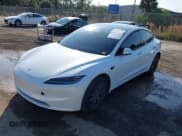 ✅ 2025 Tesla Model 3 Long Range • VIN: 5YJ3E1EA7SF988419 • Lot: 43866190. Wystawiony na IAAI z przebiegiem 7 044 mil. Bezpłatny archiwum sprzedaży aukcyjnych z USA i szczegółowy raport historii pojazdu na DreamBid. Zdjęcie 2.