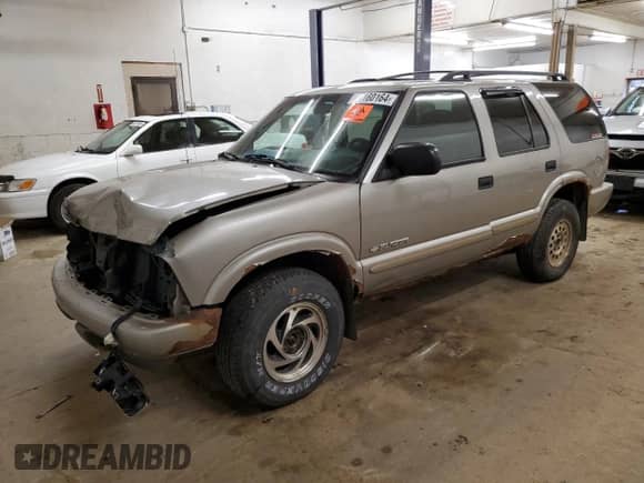2004 Chevrolet Blazer LS with VIN 1GNDT13X04K101564, listed as a Copart auction lot 80160164 with 249,187 mi miles and Salvage title. Bid and sale history available at DreamBid. Image 1.