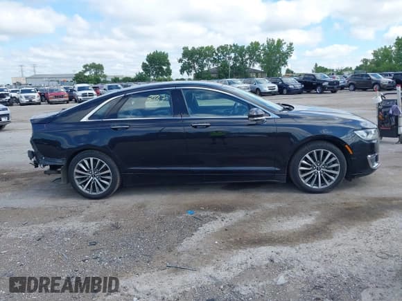 ✅ 2019 Lincoln MKZ Hybrid • VIN: 3LN6L5KU6KR621921 • Lot: 42748537. Listed on IAAI with 175,195 mi. Free auction sales archive from the USA and detailed vehicle history report at DreamBid. Image 13.