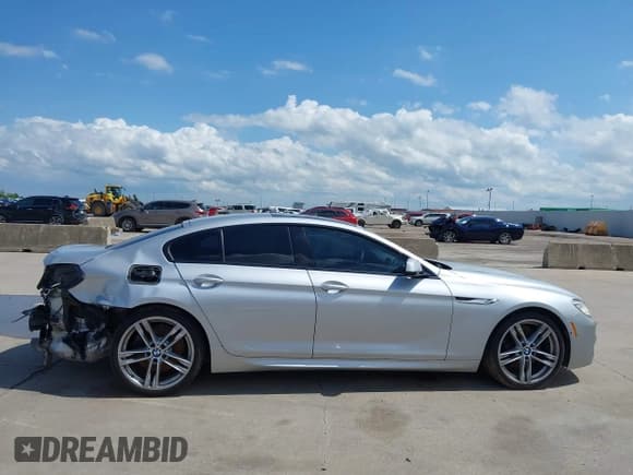✅ 2015 BMW 6 Series 650i • VIN: WBA6B2C55FGB99196 • Lot: 42107698. Listed on IAAI with 74,393 mi. Free auction sales archive from the USA and detailed vehicle history report at DreamBid. Image 14.