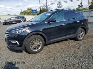 ✅ 2017 Hyundai Santa Fe 2.4L • VIN: 5NMZUDLB9HH029864 • Лот: 70692355. Опубликован ранее на Copart с пробегом 71 618 миль. Бесплатный доступ к архиву аукционных продаж из США и подробный отчёт об истории автомобиля на DreamBid. Изображение 1.