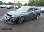 ✅ 2023 Mazda CX-30 S Premium • VIN: 3MVDMBDM9PM570034 • Lot: 42472588. Listed on IAAI with 30,715 mi. Free auction sales archive from the USA and detailed vehicle history report at DreamBid. Image 2.