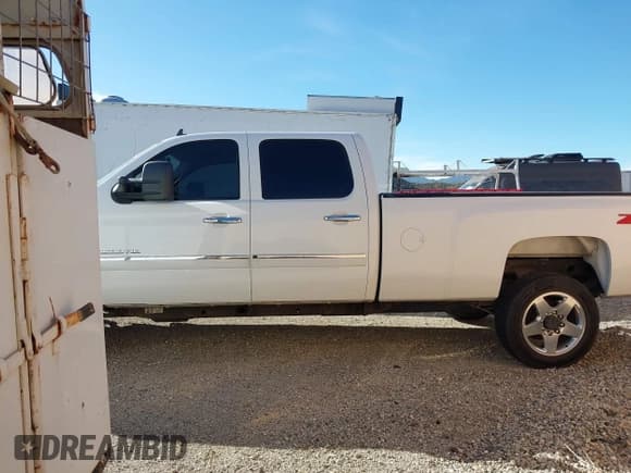 ✅ 2014 Chevrolet Silverado 2500HD LT • VIN: 1GC1CXCG5EF107871 • Lot: 43518202. Listed on IAAI with 74,569 mi. Free auction sales archive from the USA and detailed vehicle history report at DreamBid. Image 3.