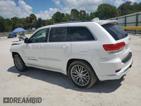✅ 2018 Jeep Grand Cherokee Summit • VIN: 1C4RJFJG2JC299686 • Lot: 66411945. Listed on Copart with 83,267 mi. Free auction sales archive from the USA and detailed vehicle history report at DreamBid. Image 2.