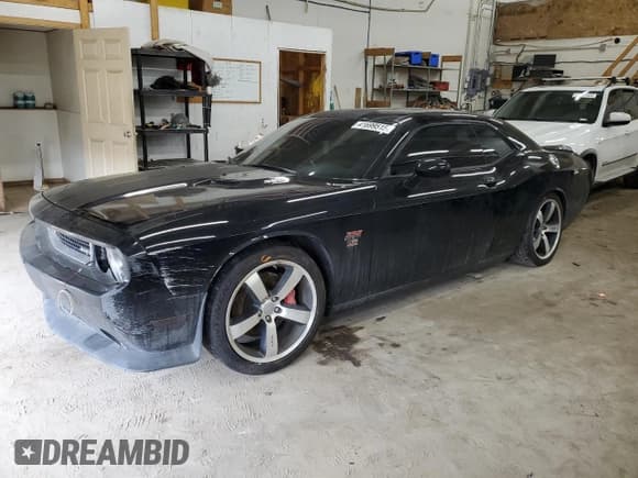 ✅ 2012 Dodge Challenger SRT-8 392 • VIN: 2C3CDYCJ1CH153656 • Lot: 41699515. Wystawiony na Copart z przebiegiem 98 051 mil. Bezpłatny archiwum sprzedaży aukcyjnych z USA i szczegółowy raport historii pojazdu na DreamBid. Zdjęcie 1.