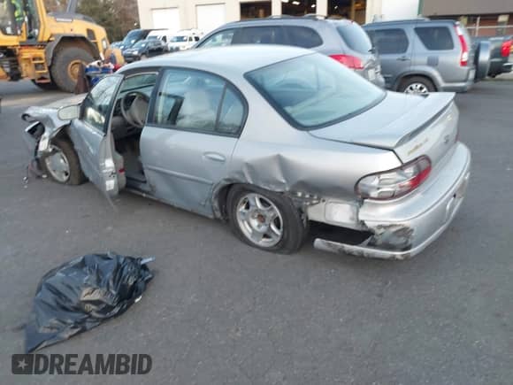 2000 Chevrolet Malibu LS z VIN 1G1NE52J6Y6164901, wystawiony jako IAAI lot #41383022 z przebiegiem 47 334 mil mil oraz . Historia ofert i sprzedaży dostępna na DreamBid. Obrazek 3.