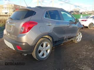 ✅ 2015 Buick Encore Premium • VIN: KL4CJHSB7FB184626 • Лот: 43688972. Опубликован ранее на IAAI с пробегом 83 540 миль. Бесплатный доступ к архиву аукционных продаж из США и подробный отчёт об истории автомобиля на DreamBid. Изображение 4.