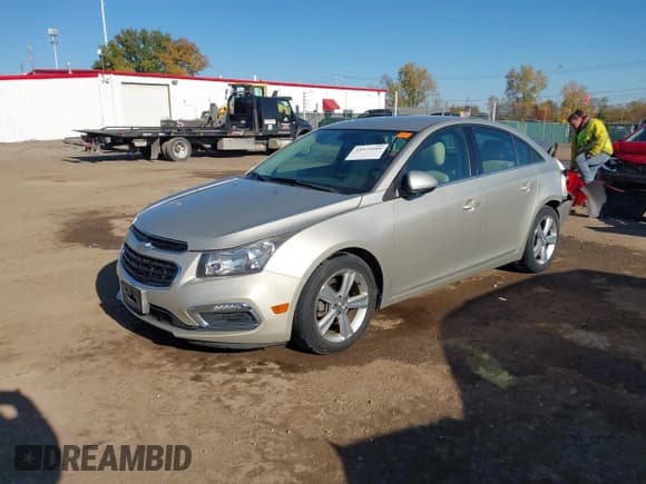 ✅ 2015 Chevrolet Cruze LT • VIN: 1G1PE5SBXF7102376 • Lot: 43539104. Listed on IAAI with 83,547 mi. Free auction sales archive from the USA and detailed vehicle history report at DreamBid. Image 2.