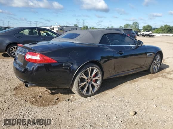 ✅ 2015 Jaguar XK • VIN: SAJWA4GB6FLB55587 • Lot: 69930905. Wystawiony na Copart z przebiegiem 49 207 mil. Bezpłatny archiwum sprzedaży aukcyjnych z USA i szczegółowy raport historii pojazdu na DreamBid. Zdjęcie 3.